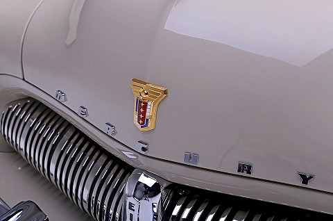 1949-mercury-eight-hood-emblem.jpg